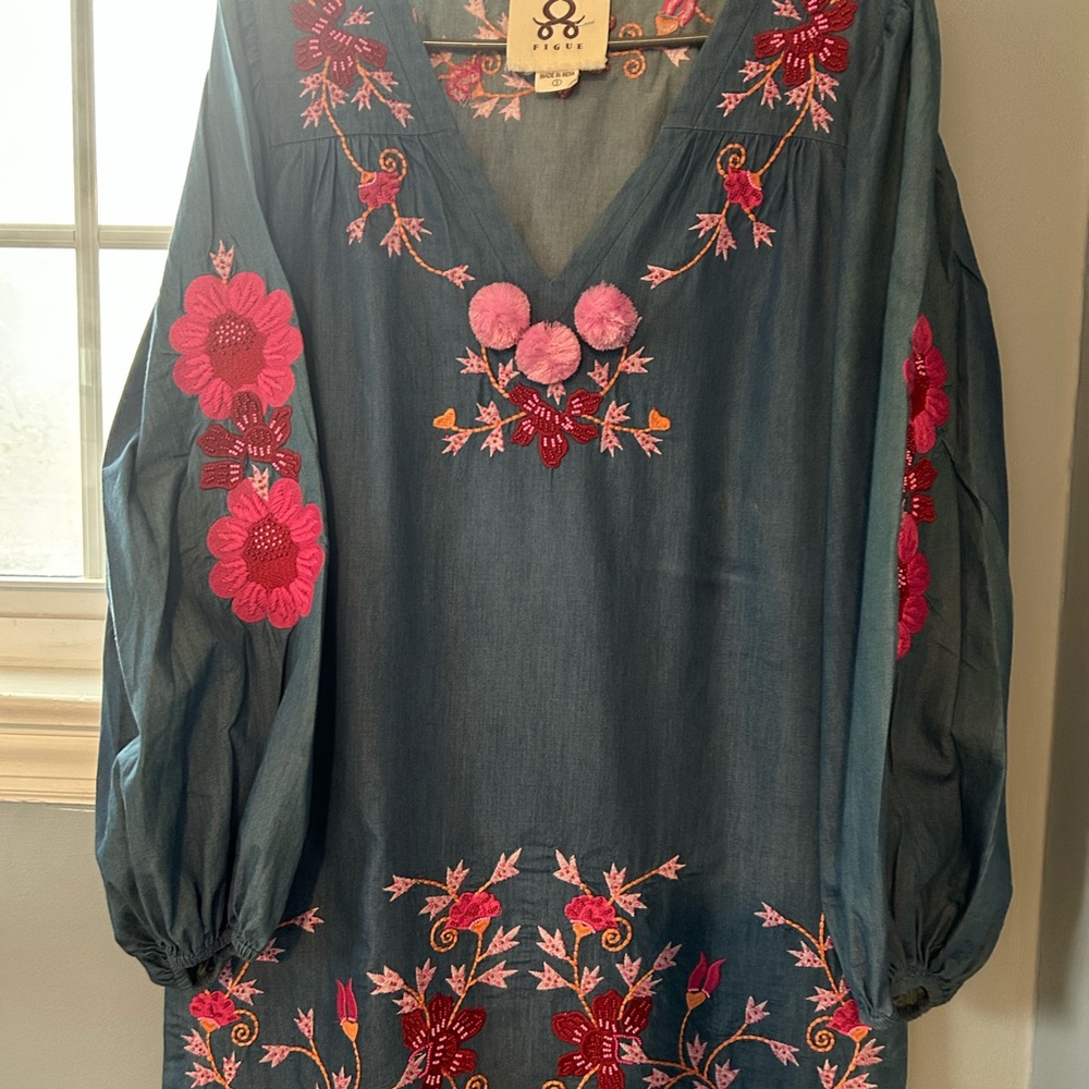 FIGUE chambray dress with embroidered and beaded flower pattern and Pom Poms